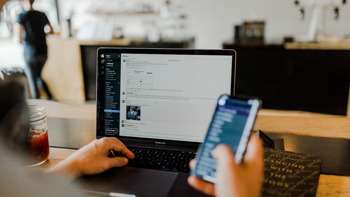 Marketer reviewing an email automation workflow on a laptop
